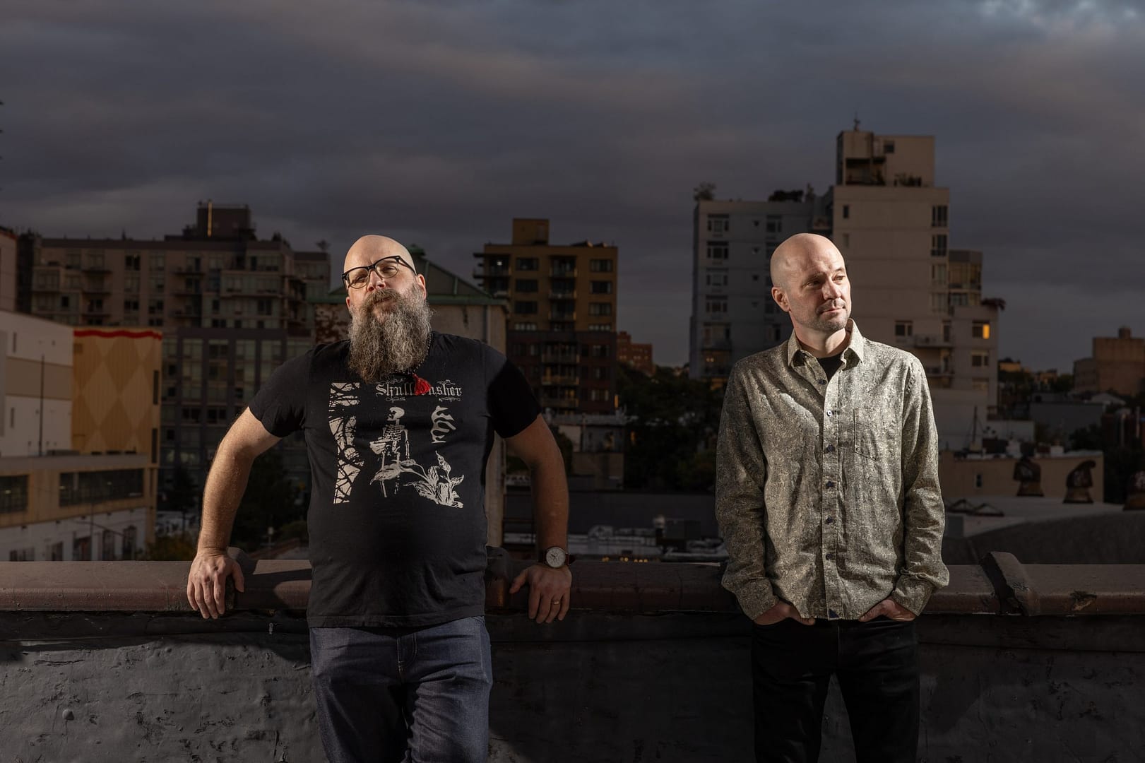 Oceanographer (Jeremy and Eric Elterman) standing on a rooftop